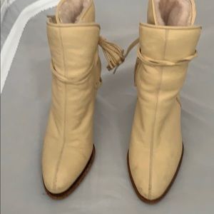 Chanel cream boots With for lining.